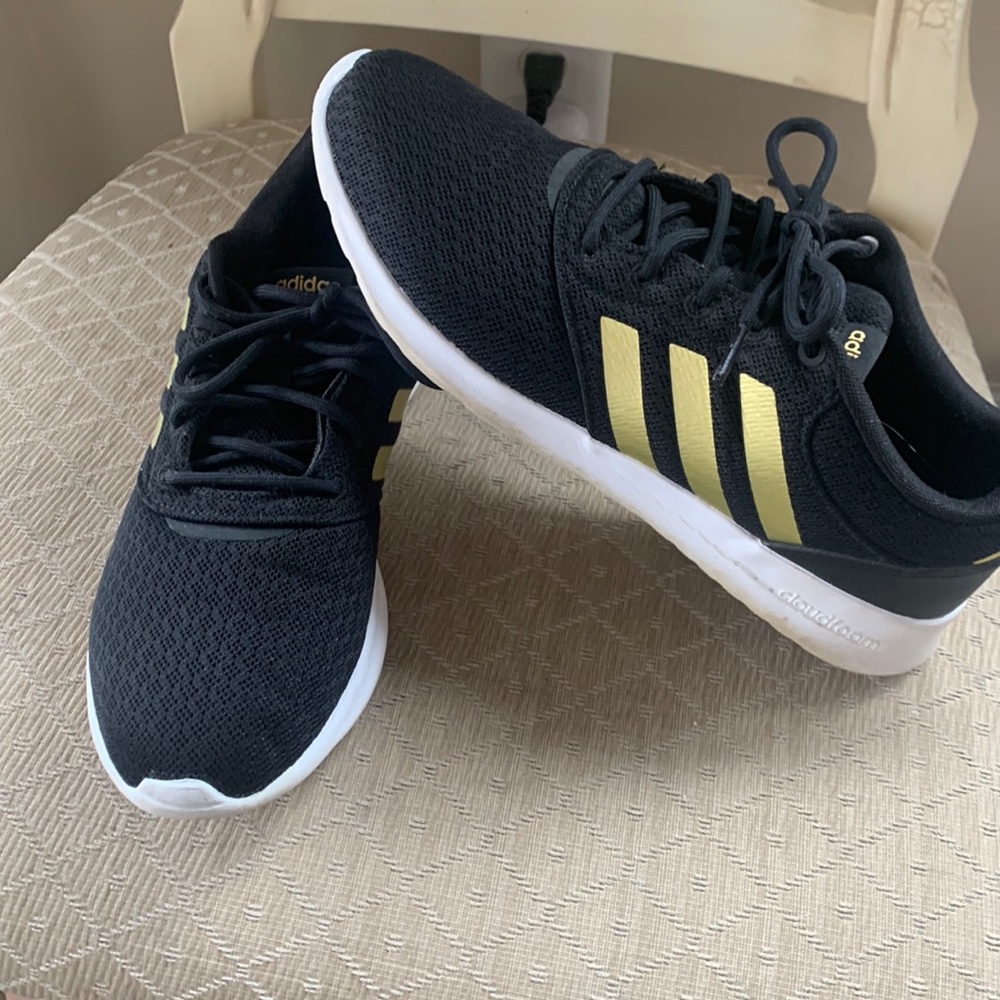 Excellent condition adidas black with gold stripes